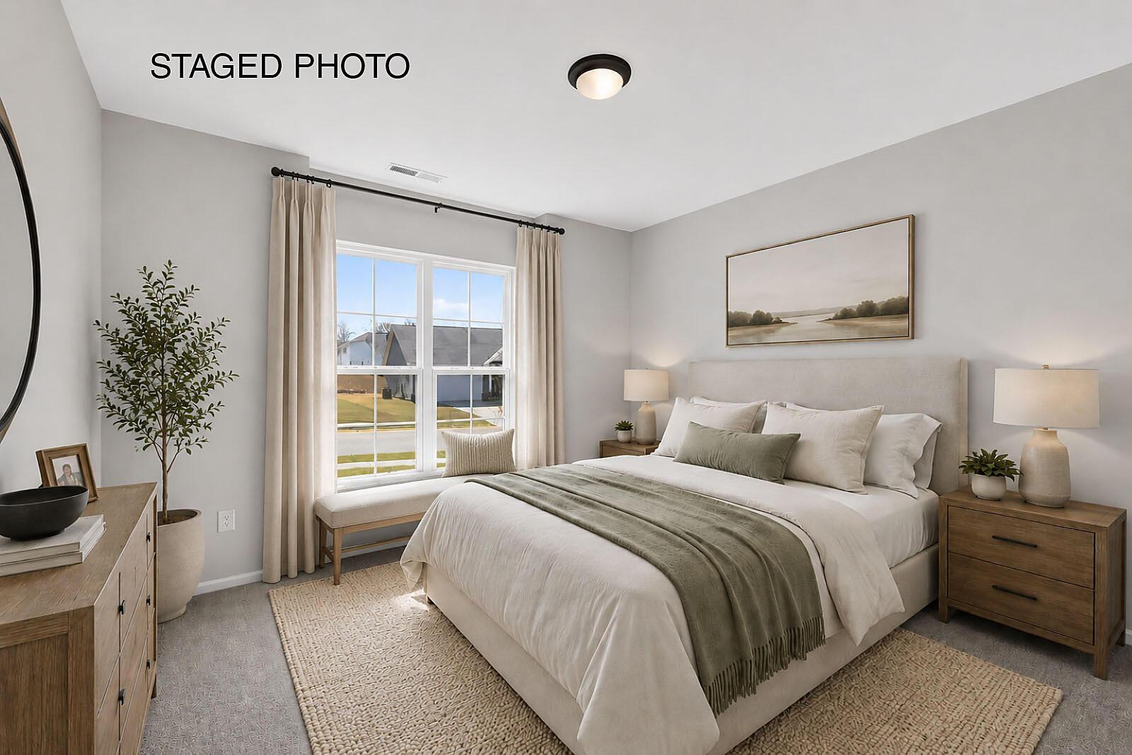 car_cwo0071_032426-11-bedroom-2-staged-text