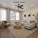 car_eqx1667-111225-vt-16-living-room-staged-new-text