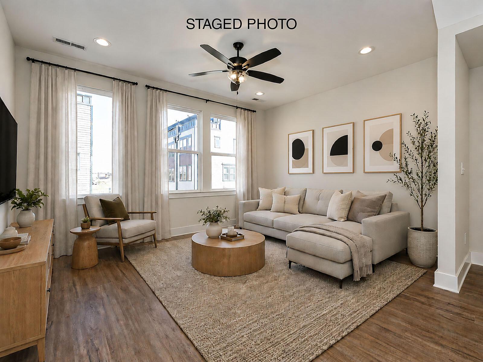 car_eqx1667-111225-vt-16-living-room-staged-new-text