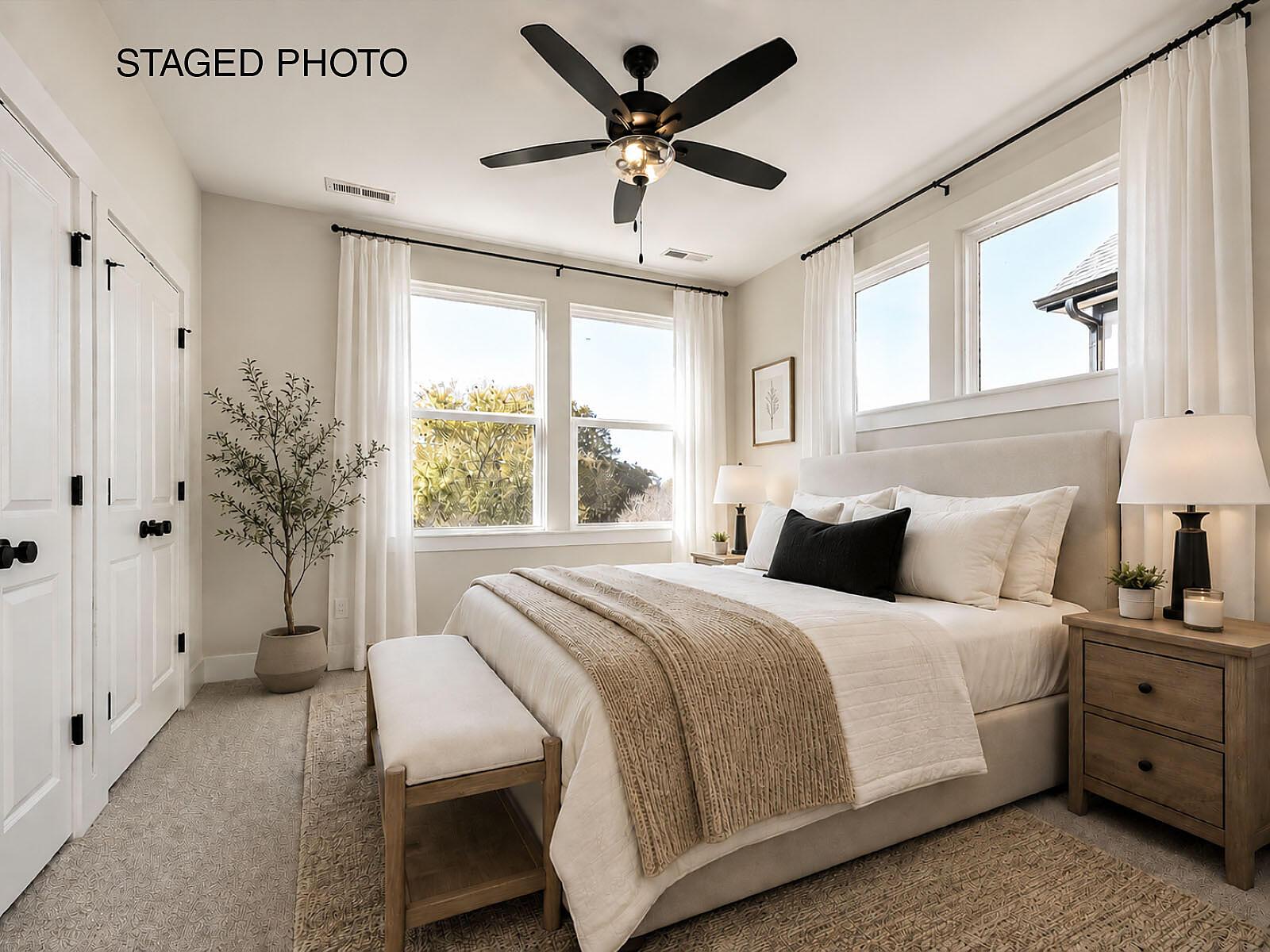 car_eqx1667-111225-vt-18-primary-bedroom-staged-new-text