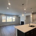 car_haf0026_012726-kitchen-to-family-room