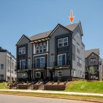 car_eqx1873_060826_vt-01-front-building-ext-w-arrow