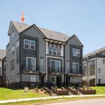car_eqx1875_060826_vt-02-front-building-ext-w-arrow