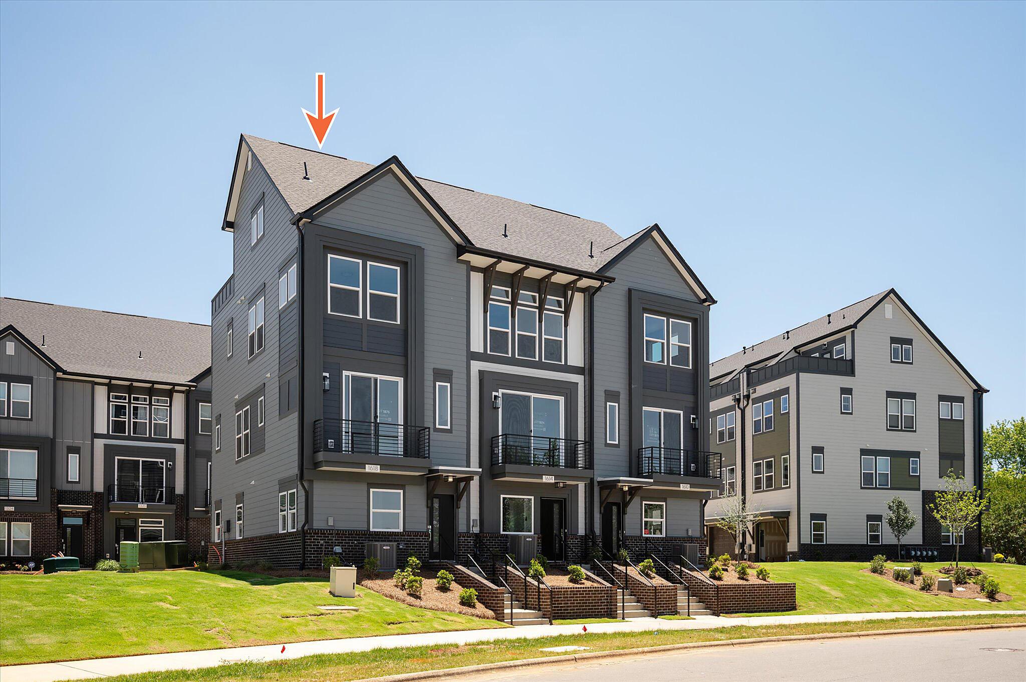 car_eqx1875_060826_vt-02-front-building-ext-w-arrow