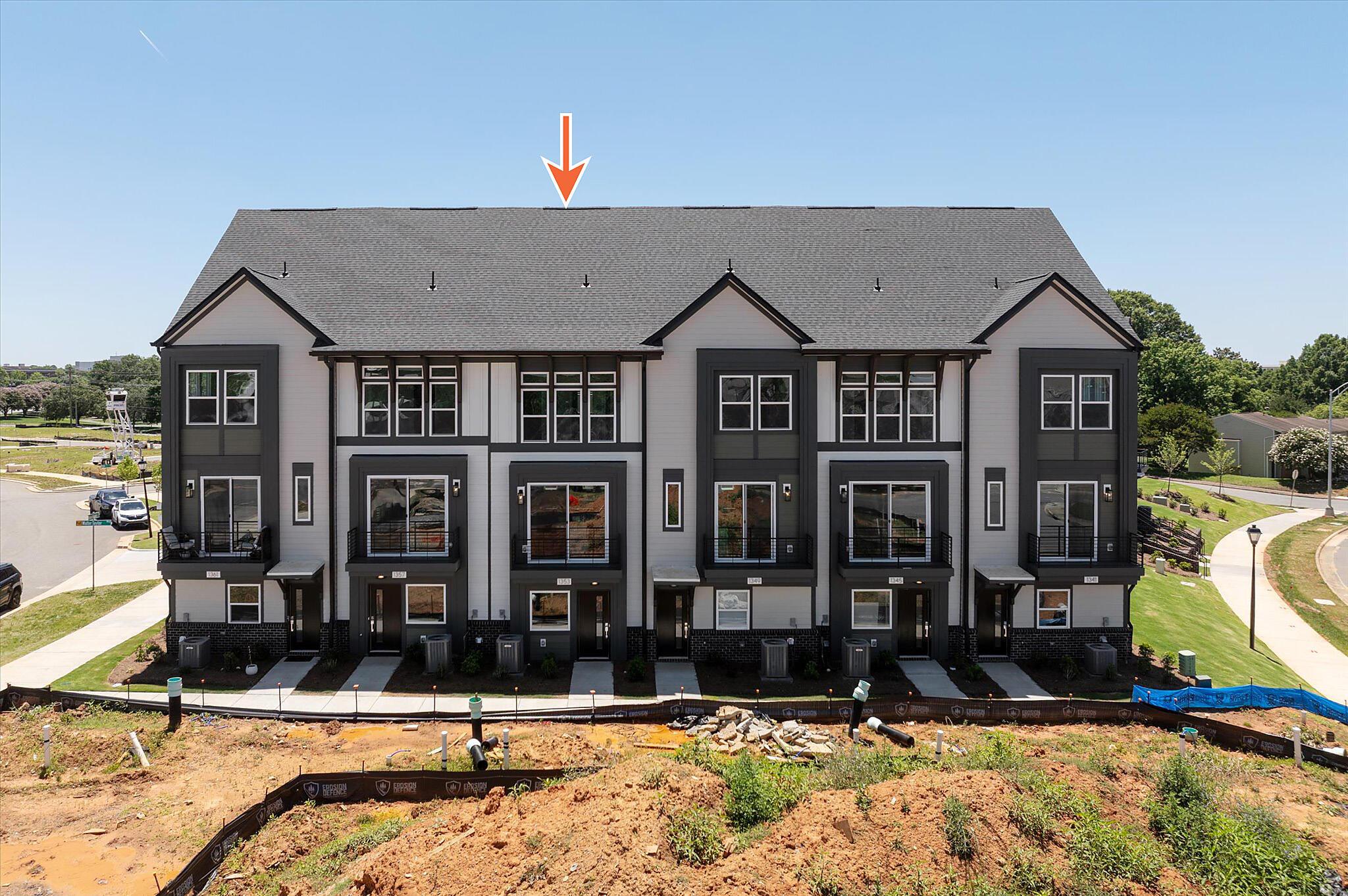car_eqx1979_060826_vt-01-front-building-ext-w-arrow