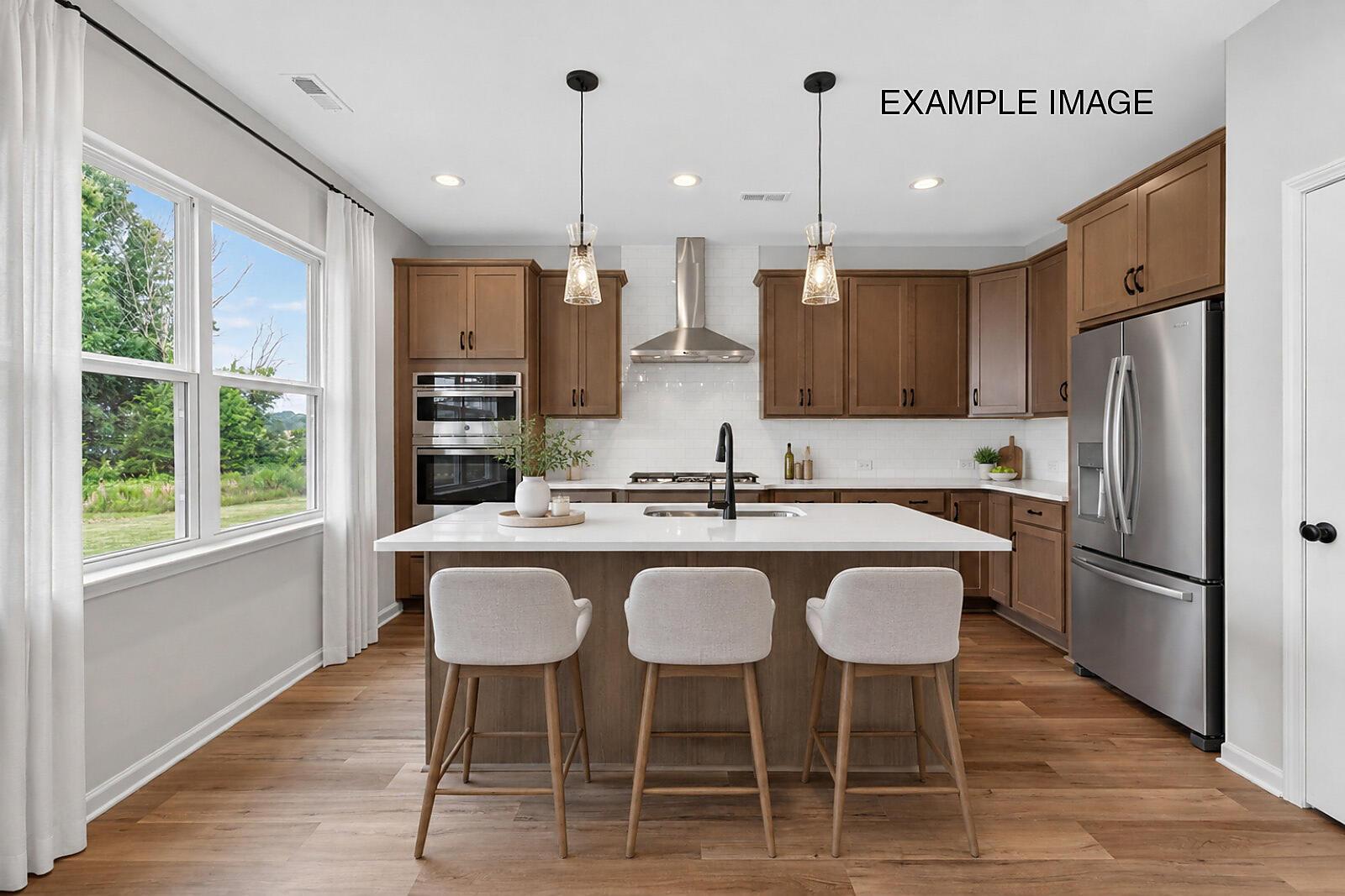 madison-vt-cal-kitchen_a-w-opt-wall-oven-ss-hood-staged